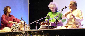 Santoor maestro Pt. Shiv Kumar Sharma, tabla maestro Ustad Zakir Hussan and flute maestro Pt. Hariprasad Chaurasia perform at a music festival