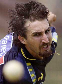 Australia's Jason Gillespie bowls during a practice session
