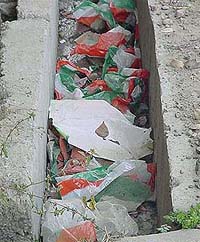 One day after the polling, bunting of the Congress found dumped in the drains