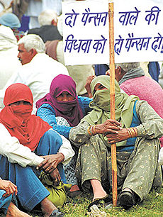 Members of the All India Ex-Services Welfare Association sitting on dharna at Rajghat.