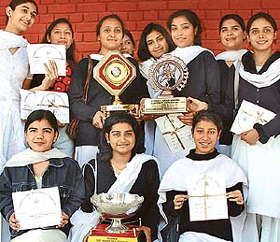 Students of Govt College for Girls, Sector-11, pose with trophies