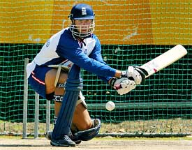 England's Michael Vaughan plays a reverse sweep during a training session