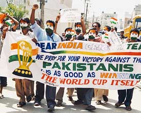 Indian fans cheer their team in Bangalore