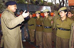 The Inspector-General of Police, Kashmir, Mr K. Rajindra Kumar, addresses the personnel of the first all-women police station