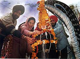 Praying with milk: MP Preneet Kaur pays obeisance at a Shiv Mandir at Bishannagar in Patiala