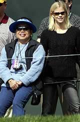 Tiger Woods mother Kultilda Woods and Woods girlfriend Elin Nordegren look on from behind the ropes