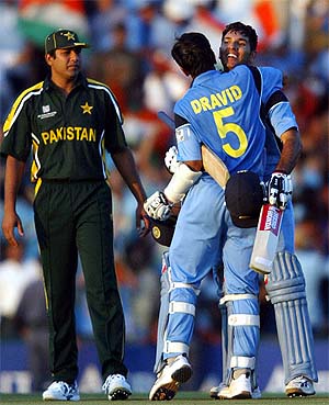 India's Rahul Dravid and Yuvraj Singh, embrace to celebrate their victory