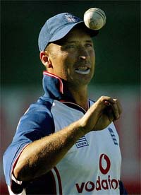 England's Captain Nasser Hussain tosses up a ball during a training session