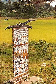 A brightly painted memorial to a prominent Bastar tribesman