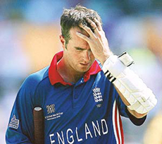 England's Michael Vaughan walks back to the dressing room after his dismissal