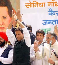 Indian Youth Congress President Randeep Surjewala with Mr Shivraj Patil (right) at a rally against the Union Budget at Jantar Mantar in the Capital on Monday. 