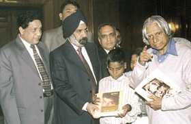 President A.P.J. Abdul Kalam being presented with books written by him and printed in Braille by Dr Dalbir Singh