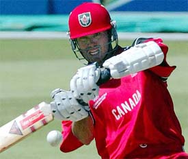 Canadian batsman John Davison hits a six