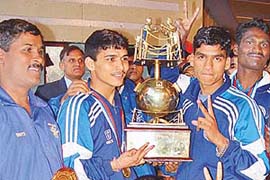 Boxers of the Army Sports Institute, Pune, with the overall trophy on the concluding day of the 10th All-India Invitation AK Misra Memorial Boxing Championship
