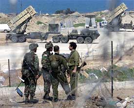 Israeli and US soldiers guard Israeli-American Patriot anti-missile batteries