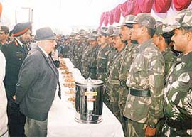 The Punjab Governor, Lieut-Gen J.F.R. Jacob (retd), interacts with troops after inaugurating a new transit camp complex in Chandigarh