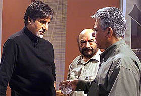 Bollywood superstar Amitabh Bachchan rehearses with co-star Om Puri
