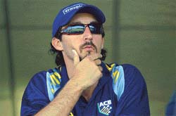 Australia's Jason Gillespie looks out from the dressing room 