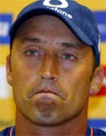 England captain Nasser Hussain speaks at a news conference