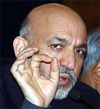 Afghanistan President Hamid Karzai addresses a luncheon session 