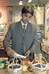 A tea seller prepares a brew at an international convention in Kolkata 