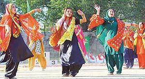 Girls of Government Polytechnic for Women, Sector 10, perform giddha during the athletic meet of the institute in Chandigarh