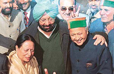 The Punjab Chief Minister, Capt Amarinder Singh, congratulates Himachal Chief Minister Virbhadra Singh after the oath ceremony at Raj Bhavan in Shimla