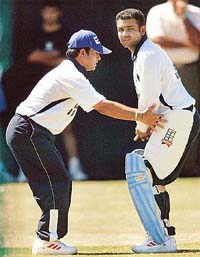 Sachin Tendulkar gives batting tips to his opening partner Virender Sehwag 