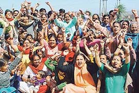 Darshani Bagh residents protest against acquisition of their land by the UT Administration in Chandigarh on Friday.