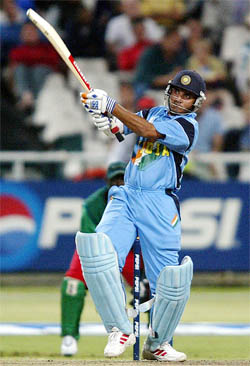 Indian captain Sourav Ganguly smashes the ball