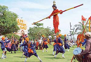 Gatka performers and a rope-walker enthral visitors at the Spring Fest Flower Festival at Town Park, Sector 5, Panchkula, on Saturday.