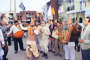 ISKCON devotees participate in a nagar sankirtan in Sector 44, Chandigarh, on Saturday.