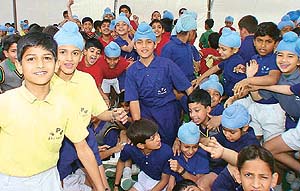 Jubilant junior students of Yadavindra Public School, SAS Nagar, buck up participants at the annual cross-country races of the school on Saturday. 