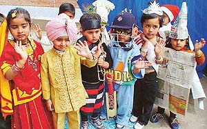 Tiny tots of Linnet Preparatory School, Sector 43, take part in a fancy dress contest at Pracheen Kala Kendra, Sector 35, Chandigarh, on Saturday.