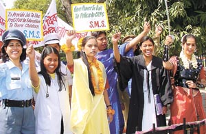 Activists of the Swastik Mahila Samiti demanding 33 per cent reservation