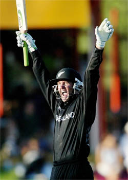 New Zealand batsman Nathan Astle celebrates his century