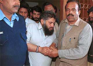 Ahmed Abdul Qadus is brought to an anti-terrorist court in Rawalpindi