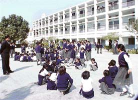 An imposing view of the school building of Sanatan Vidya Mandir Senior Secondary School