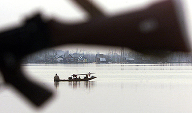 A Kashmiri family rows their boat