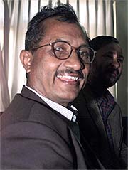 Maoist Politburo member Dina Nath Sharma takes part in a Communist factions meeting in Kathmandu