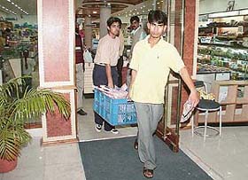 Unauthorised and unstamped meat seized from one of the department stores of the city being taken for destruction by the municipal corporation staff in Chandigarh