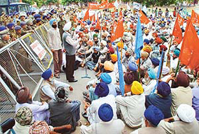 A leader addresses a farmers� rally held in support of their demands near the Inter-State Bus Terminus in Sector 17, Chandigarh