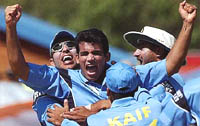 Zaheer Khan celebrates the dismissal of New Zealand's Nathan Astle