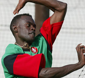 Kenya's Tony Suji bowls at the nets in Durban 