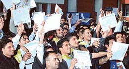 Students show their degrees