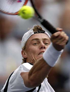 Australia's Lleyton Hewitt returns a shot to David Spadea of the USA 