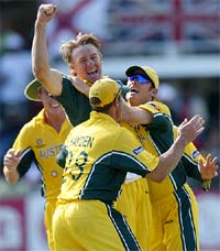 Australia�s Andy Bichel celebrates with teammates after running out Sri Lanka�s Aravinda de Silva