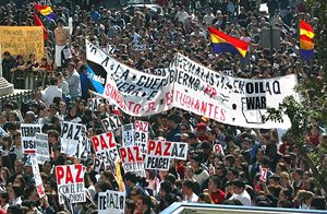 Thousands take to the streets of Madrid in a spontaneous protest against war 