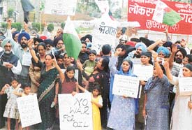 Activists of the Inquilabi Kendra stage an anti-US protest