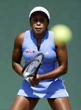 Chandra Rubin of USA awaits a return from Amelie Mauresmo of France 